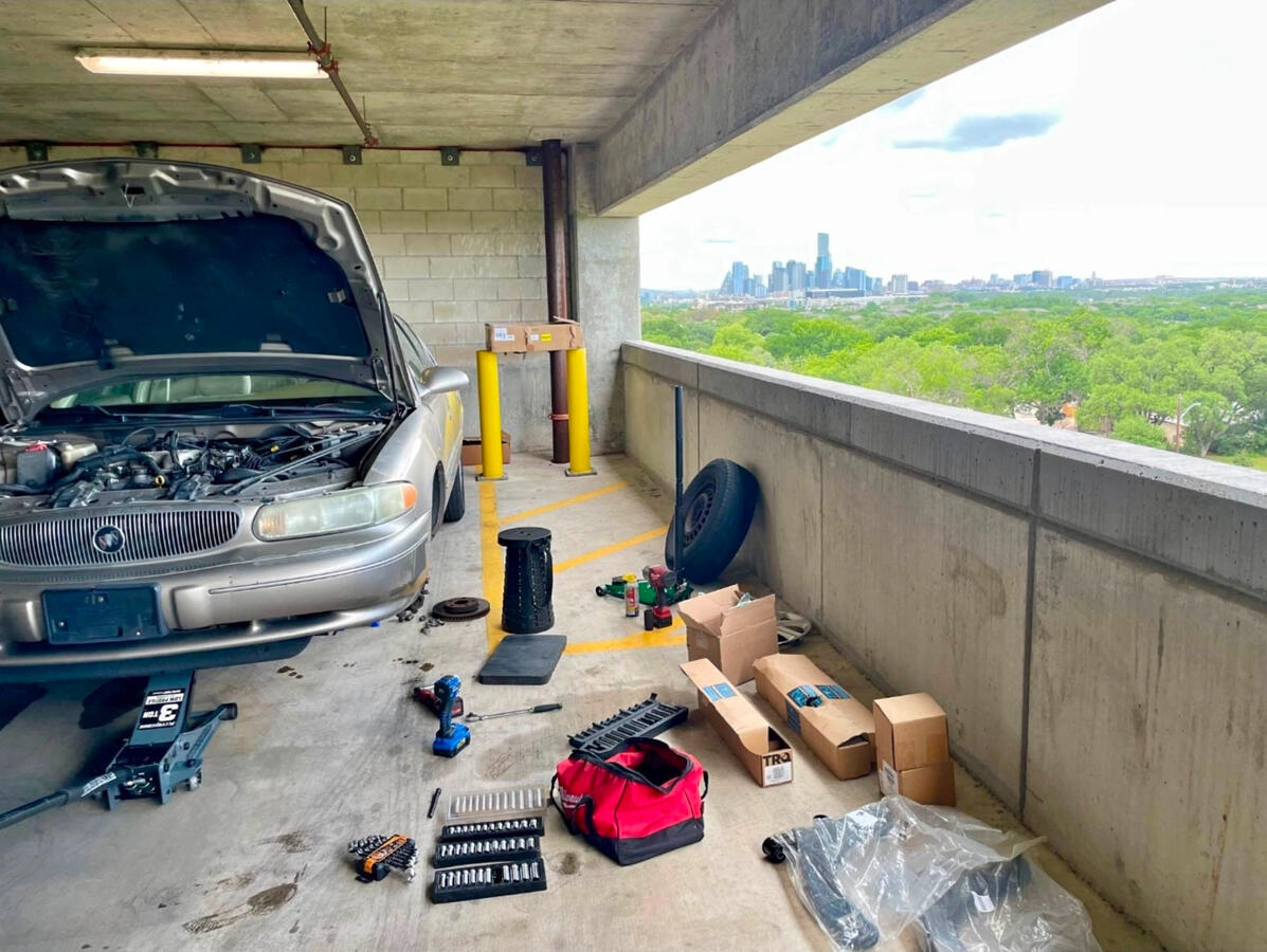 On-Site Mobile Repair β Downtown Fort Worth Mobile mechanic performing vehicle repairs in Fort Worth parking garage