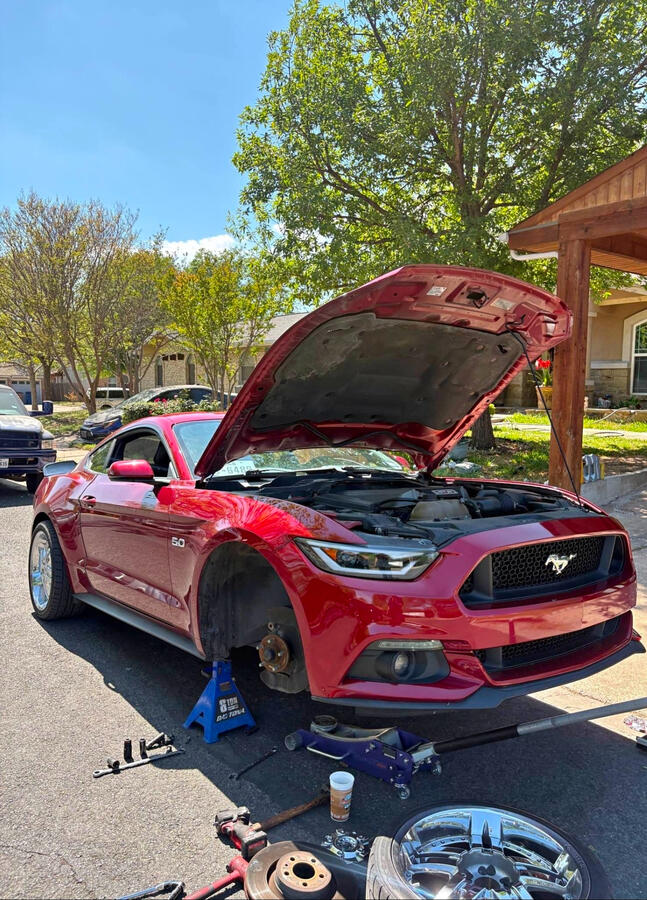 Mobile Brake Repair β Ford Mustang GT Fort Worth mobile mechanic performing brake repair on Ford Mustang GT at customer home